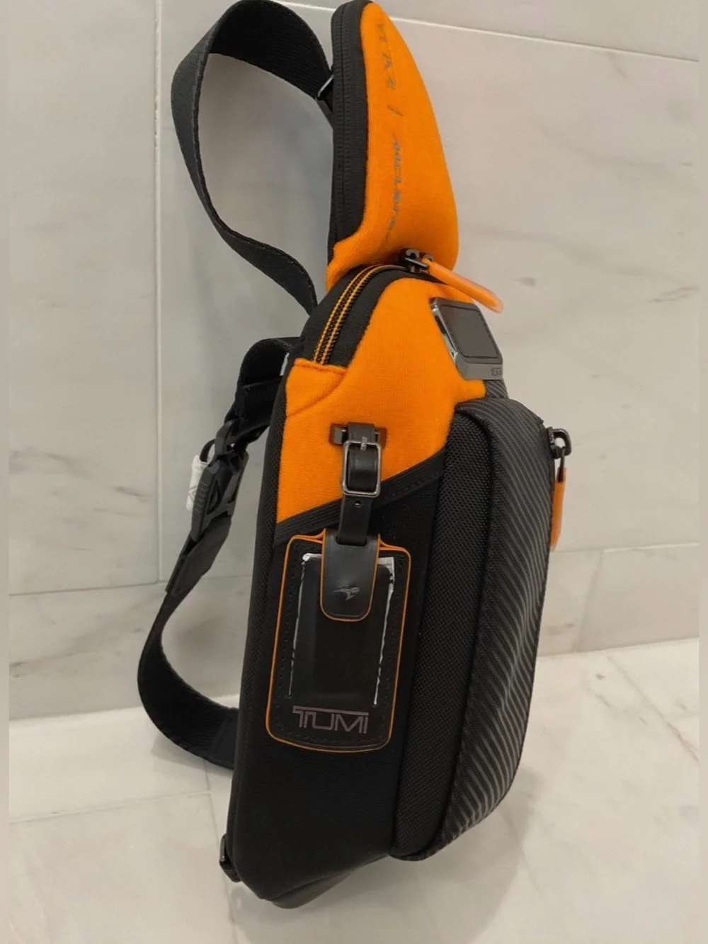 NEW Tumi McLaren Esports Downforce PRO Sling Crossbody - Black & Papaya Orange
